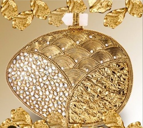 Amishi Gold metal clutch with Crystal embellishments and Agate clasp