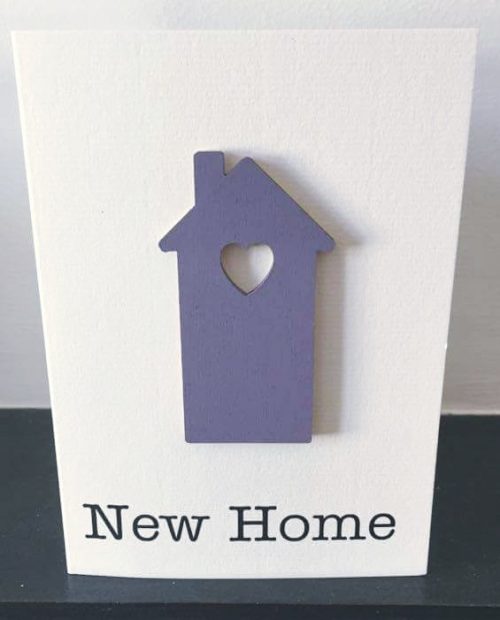 new home - purple wooden house card