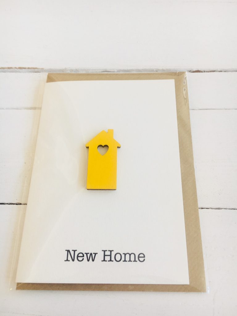 New Home card - yellow wooden house with cut out heart - Sartorial Boutique and Gifts
